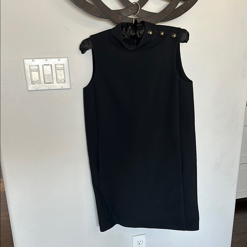 Chic Black Sleeveless Dress with Button Detail